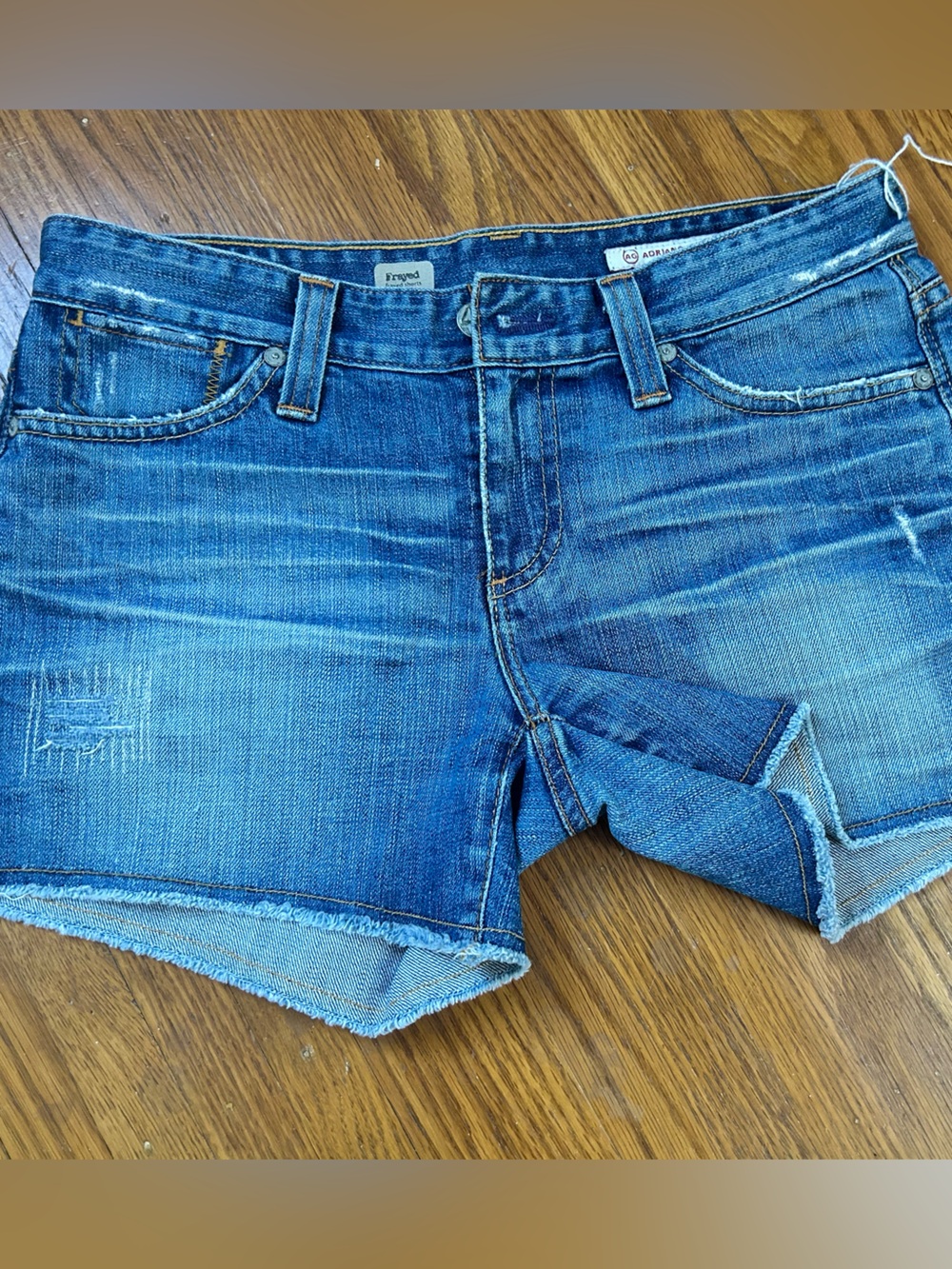 Ag Adriano Goldschmied Distressed Blue Denim shorts.